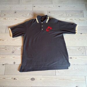 NWT FULLER ESTATES POLO SHIRT – BLACK WITH RED EMBLEM – SIZE LARGE